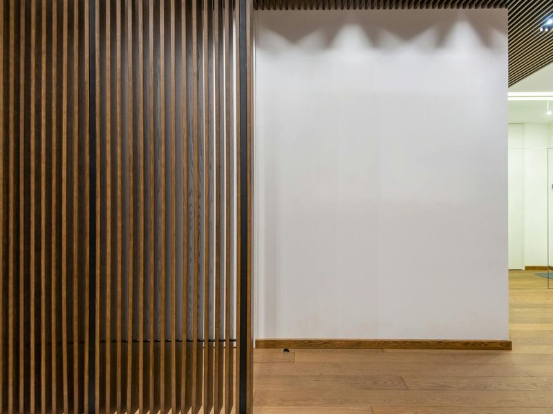 Spacious minimalist room with natural light for home workouts.